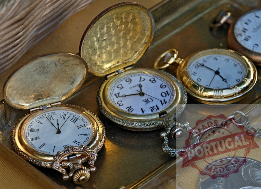 Vintage pocket watches showing classic timekeeping and antique details | Ornate gold pocket watches displaying old-fashioned timepieces and their intricate designs - Realized with Pictrs.com