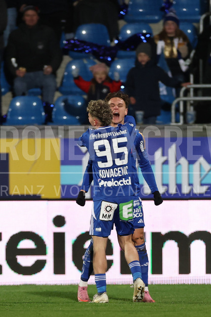 TSV Egger Glas Hartberg vs SV Oberbank Ried – Austrian Bundesliga Match | The image shows Lukas Fridrikas (Hartberg) and Damjan Kovacevic (Hartberg) rejoicing the goal, at the Bundesliga match TSV Hartberg vs SV Ried at Profertil Arena Hartberg. 22.11.2025