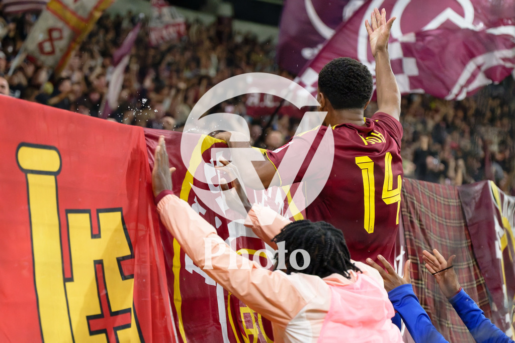 UEFA Conference League Play-offs 2nd leg - Servette FC v FC Shakhtar Donetsk | Lilian Njoh (14 Servette FC) celebrates with fans after scoring his team's first goal  during the UEFA Conference League Play-offs 2nd leg match between Servette FC and FC Shakhtar Donetsk at Stade de Geneve in Geneva, Switzerland
