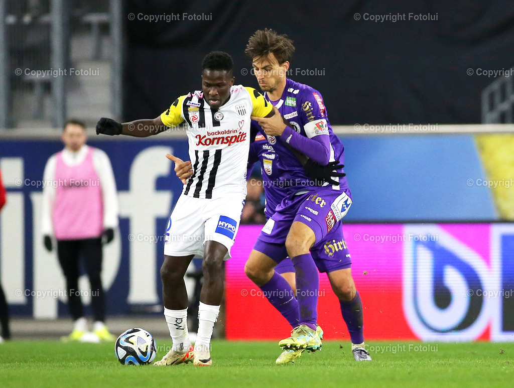 A_LUI_11022024_12 | SPORT,FUSSBALL ,ADMIRAL BUNDESLIGA 11.02.2024 LASK-AUSTRIA KLAGENFURT,IM BILD: MOUSSA KONE (LASK) UND THORSTEN MAHRER (KLAGENFURT) FOTO.FOTOLUI/MW