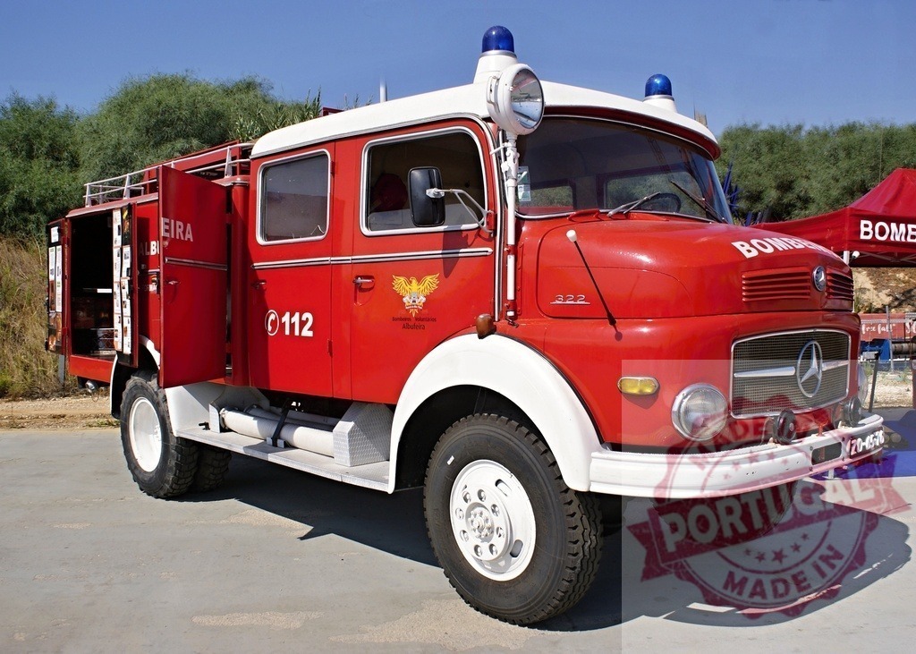 Vintage Mercedes-Benz fire truck parked outdoors in Portugal | Red vintage Mercedes-Benz fire truck from Portuguese Bombeiros volunteer fire department - Realized with Pictrs.com
