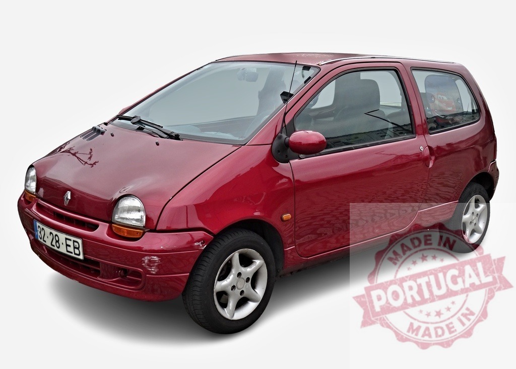 Red Renault Twingo showcasing its compact design and vibrant color | Small, fuel-efficient red Renault Twingo parked, embodying practicality and urban mobility - Realized with Pictrs.com