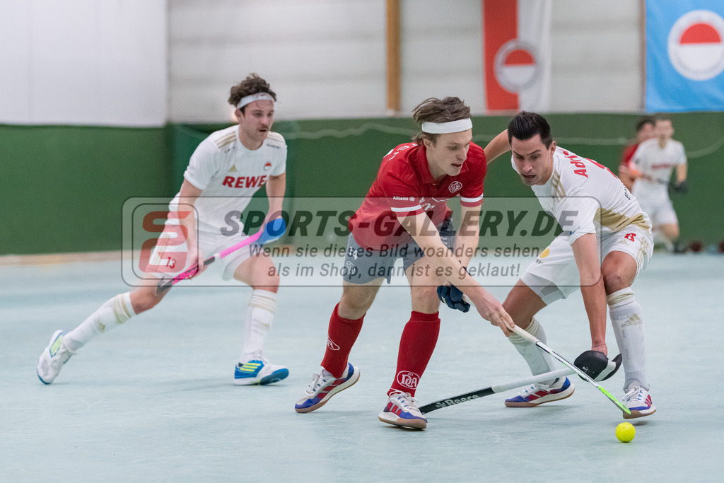 HK_20230128_103615 | 1. Bundesliga 1/4 Finale ( Herren ) Rot-Weiss Köln - Club an der Alster am 28.1.2023 Rot-Weiss Köln  , Köln , Simon Mundorf ( Club an der Alster #14 ) , Forian Adrians ( Rot-Weiss Köln #8 )