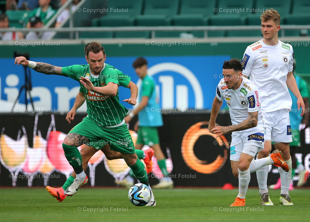 A_LUI_14042024_12 | SPORT,FUSSBALL.ADMIRAL BUNDESLIGA SK RAPID-AUSTRIA KLAGENFURT14.04.2024 IM BILD:MICHAEL SOLLBAUER  (RAPID) UND SINAN KARWEINA (KLAGENFURT) FOTO.FOTOLUI/MW