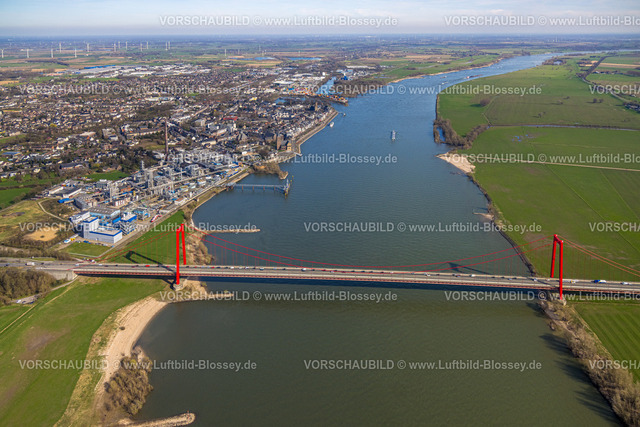 Emmerich240313230 | Luftbild, Emmericher Rheinbrücke, längste Hängebrücke Deutschlands, Fluss Rhein mit Stadtansicht und KLK Emmerich Chemiewerk, Deichvorland bei Grieth Landschaftsschutzgebiet LSG, Emmerich am Rhein, Nordrhein-Westfalen, Deutschland