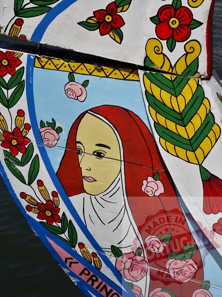 Traditional Bangladeshi boat art featuring a woman portrait. Aveiro - Portugal | Colorful folk art painting on a Bangladesh boat depicting a woman with flowers - Realized with Pictrs.com