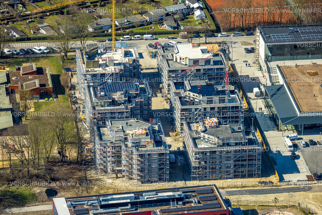 Herne250302039 | Luftbild, Kaiserquartier Herne, Baustelle mit Neubau einer Wohnanlage und Wohnsiedlung, Kita Lackmanns Hof Kindergarten und Hochhaus Wohnsiedlung, Baukau, Herne, Ruhrgebiet, Nordrhein-Westfalen, Deutschland