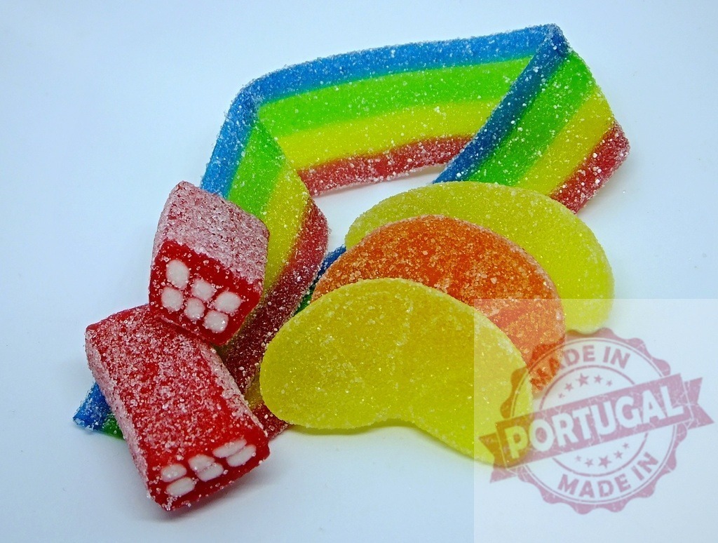 Colorful sour sugary candy gummy snack selection | Assortment of sweet and sour sugary gummies with rainbow, red, and citrus flavors - Realisiert mit Pictrs.com
