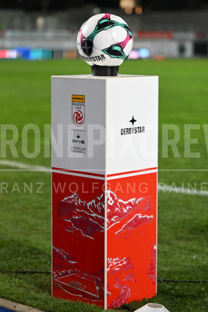 TSV Egger Glas Hartberg vs SV Oberbank Ried – Austrian Bundesliga Match | TSV Egger Glas Hartberg and SV Oberbank Ried. High-intensity match action, tackles, shots on goal, celebrations, fan atmosphere and stadium scenes captured in professional quality. The image shows the matchball.