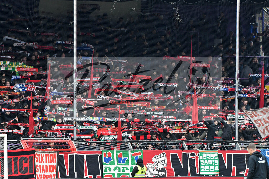 20200208_OSNFCN_0023 | Fußball, Herren: . Die Fans vom 1. FC Nuernberg waehrend des Spiels der 2. Bundesliga zwischen VfL Osnabrueck und 1. FC Nuernberg im Stadion an der Bremer Bruecke am 08.02.2020 in Osnabrueck, Deutschland.DFB / DFL REGULATIONS PROHIBIT ANY USE OF PHOTOGRAPHS AS IMAGE SEQUENCES AND/OR QUASI-VIDEO. - Realisiert mit Pictrs.com
