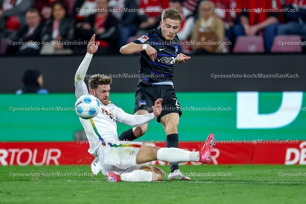 1FC05042501042 | 05.04.2025, Fußball, 1. FC Köln - Hertha BSC, 2.. Fußball Bundesliga, 28. Spieltag, RheinEnergie-STADION, Saison 2024 2025: Jan Thielmann (FC Koeln #29) im Zweikampf gegen Marten Winkler (Hertha BSC #22) DFB regulations prohibit any use of photographs as image sequences and or quasi-video.
