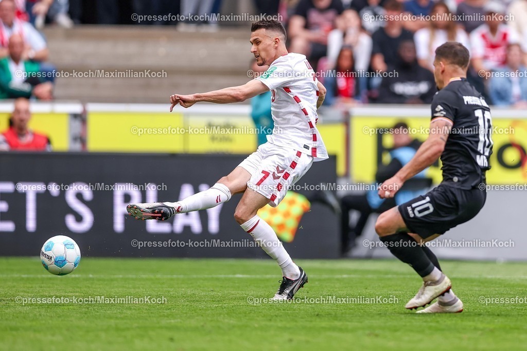 1FC20042501176 | 20.04.2025, Fußball, 1. FC Köln - Preußen Münster, 2.. Fußball Bundesliga, 30. Spieltag, RheinEnergie-STADION, Saison 2024 2025: Dejan Ljubicic (FC Koeln #7) gegen Sebastian Mrowca (Preussen Muenster #10) DFB regulations prohibit any use of photographs as image sequences and or quasi-video.