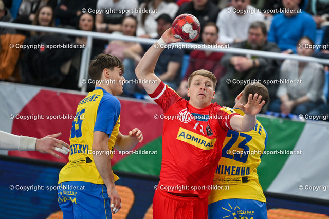 AUT, Handball EHF EURO 2024 Quali, Oesterreich vs Ukraine | 11.03.2023, Sporthauptschule Linz-Kleinmuenchen, AUT, Handball EHF EURO 2024 Quali, Oesterreich vs Ukraine, im Bild Lukas Hutecek (AUT) vs Taras Minotskyi (UKR), Andrii Akimenko (UKR)


// Handball EHF EURO 2024 Quali Match between Austria and Ukraine in Linz, Austria on 2023/03/11