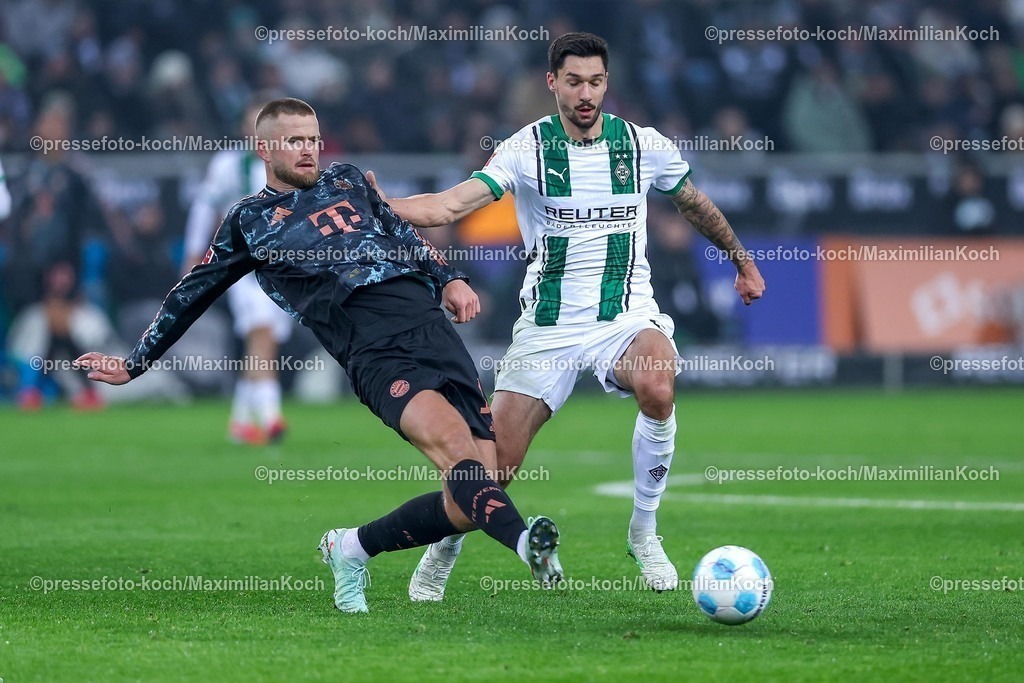 BMG11012501019 | 11.01.2025, Fußball, Borussia Mönchengladbach - FC Bayern München, 1. Fußball Bundesliga, Borussia-Park, Saison 2024 2025: Eric Dier (Bayern #15) im Zweikampf gegen Tim Kleindienst (Mönchengl. #11)DFB regulations prohibit any use of photographs as image sequences and or quasi-video.