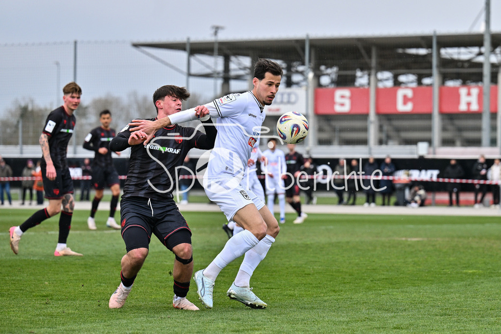 FC Ingolstadt - SSV Ulm 1846 Fussball  | INGOLSTADT, GERMANY - 25. MAERZ: im Duell Timo HENGMITH (FC Ingolstadt 41) und Lukas MAZAGG (SSV Ulm 27) während dem Testspiel zwischen dem FC Ingolstadt und dem SSV Ulm 1846 Fussball auf Platz 4 am Audi Sportpark