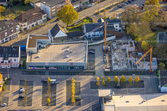 Hamm231101964 | Luftbild, Nahversorgungszentrum mit KiK und dm Drogeriemarkt mit Baustelle Neubau, umgeben von herbstlichen Laubbäumen, Stadtbezirk Herringen, Hamm, Ruhrgebiet, Nordrhein-Westfalen, Deutschland