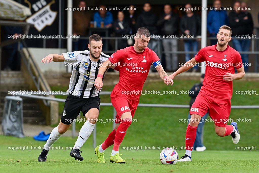 SVG Bleiburg vs. SAK 23.9.2023 | #9 Adnan Besic (K) SVG Bleiburg, #24 Zoran Vukovic (K) SAK, #22 Leo Ejup SAK, SVG Bleiburg vs. SAK 23.9.2023, SVG Bleiburg vs. SAK am 23.09.2023 in Bleiburg (Karl Kornberger Stadion), Austria, (Photo by Bernd Stefan)