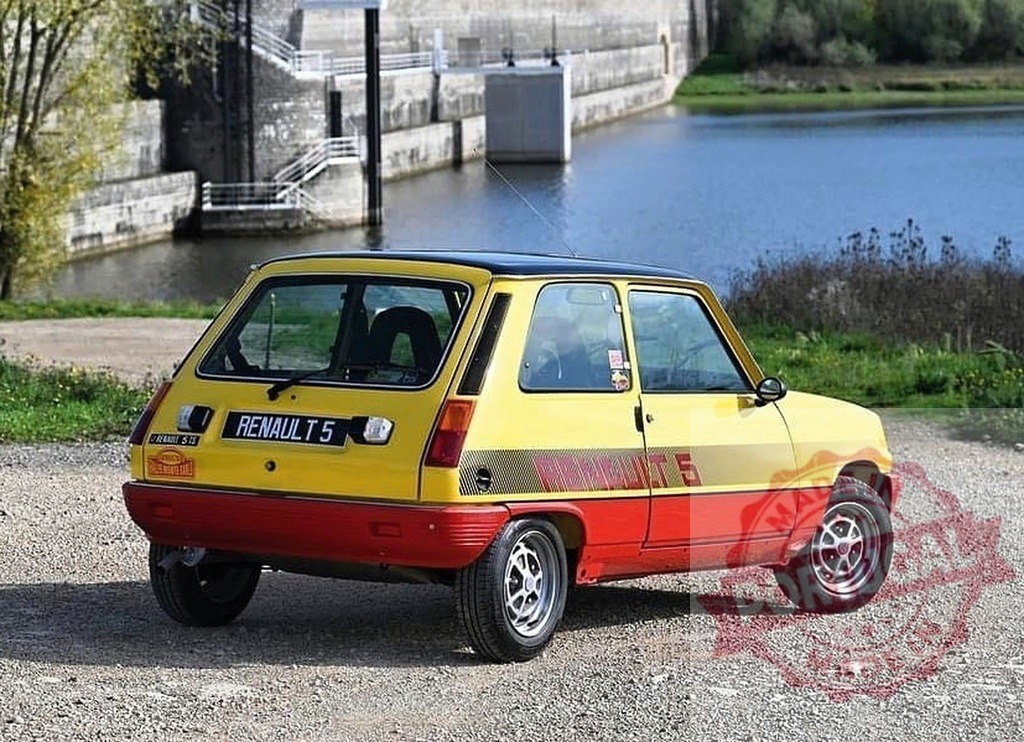 Renault 5 classic car parked by waterfront | Renault 5 vintage yellow and red hatchback parked on gravel near water and concrete dam - Realized with Pictrs.com
