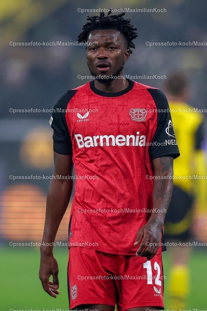 BVB10012502317 | 10.01.2025, Fußball, Borussia Dortmund - Bayer 04 Leverkusen, 1. Fußball Bundesliga, 16. Spieltag, Signal Iduna Park, Saison 2024 2025: Edmond Tapsoba (Bayer04 Leverkusen #12)DFB regulations prohibit any use of photographs as image sequences and or quasi-video.