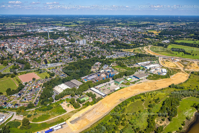 Wesel240802118 | Luftbild, Gewerbegebiet Am Lippeglacis mit Mineralmahlwerk C. Welsch GmbH, am Lippemündungsraum mit Baustelle, Fluss Lippe und Naturschutzgebiet NSG, Wesel, Ruhrgebiet, Niederrhein, Nordrhein-Westfalen, Deutschland