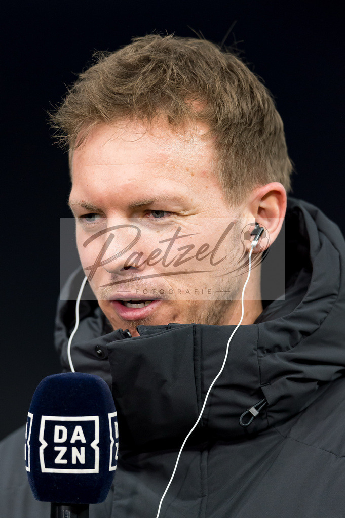 BSCFCB20220123_178 | Fussball, Herren: Trainer Julian Nagelsmann (FC Bayern Muenchen) im Interview bei dem Spiel der 1. Bundesliga zwischen Hertha BSC und FC Bayern Muenchen im Olypiastadion am 23.01.2022 in Berlin, Deutschland.DFB / DFL REGULATIONS PROHIBIT ANY USE OF PHOTOGRAPHS AS IMAGE SEQUENCES AND/OR QUASI-VIDEO. - Realisiert mit Pictrs.com
