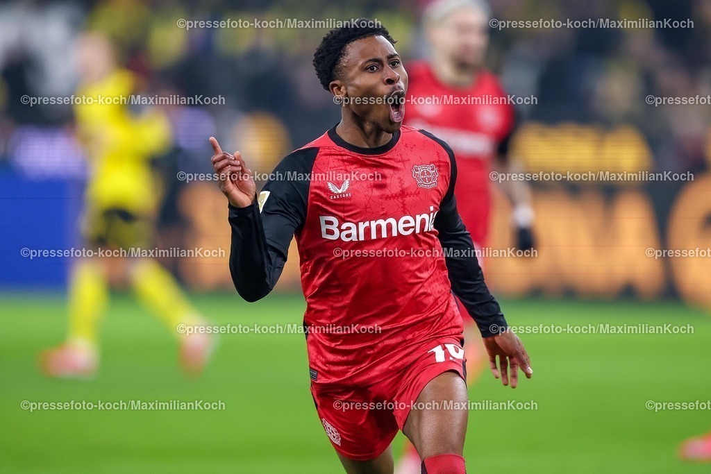 BVB10012502234 | 10.01.2025, Fußball, Borussia Dortmund - Bayer 04 Leverkusen, 1. Fußball Bundesliga, 16. Spieltag, Signal Iduna Park, Saison 2024 2025: Torjubel nach dem Treffer zum 1:0 durch Nathan Tella (Bayer04 Leverkusen #19)DFB regulations prohibit any use of photographs as image sequences and or quasi-video.