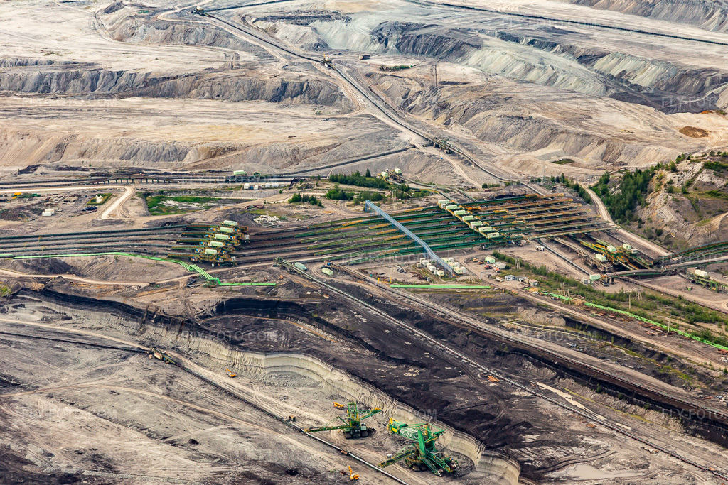 Aerial view: Conveyor belts in the opencast brown coal mine 