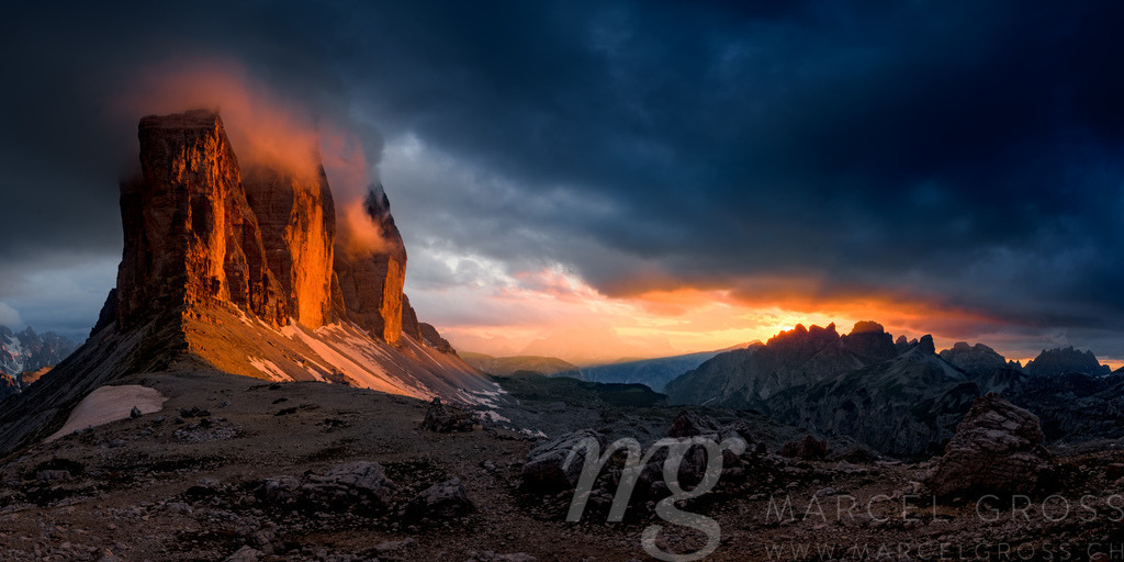 mordor-like sunset at tre cime | Tre Cime at sunset. one of the most outstanding sunsets i ever got to witness. we climbed Forcella Lavaredo to see the sunset and the enlightening the Tre Cime. This picture is created form a multiexposure HDR-Panorama since the dramatic light was very hard to capture. - Realisiert mit Pictrs.com