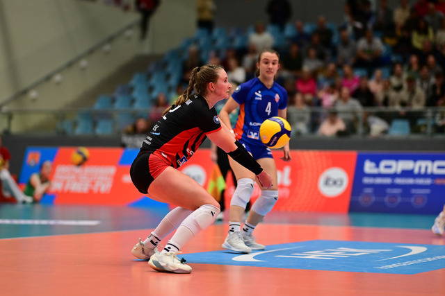 Volleyball I Frauen I Saison 2025-2026 I Bundesliga I 5. Spieltag I ETV Hamburger Volksbank Volleys - Dresdner SC I 09082 | Hannah Ammerman (12, ETV Hamburger Volksbank Volleys) - Realisiert mit Pictrs.com