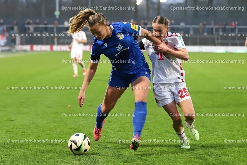 xSSC28032501012 | 28.03.2025, xsscx, Frauen Fußball, 1. FC Köln - FC Carl Zeiss Jena, 1. Fußball Bundesliga, Franz-Kremer-Stadion, Saison 2024 2025: Toma Ihlenburg (FC Carl Zeiss Jena 3) im Zweikampf gegen Laura Donhauser (1. FC Köln 25) DFB regulations prohibit any use of photographs as image sequences and or quasi-video.