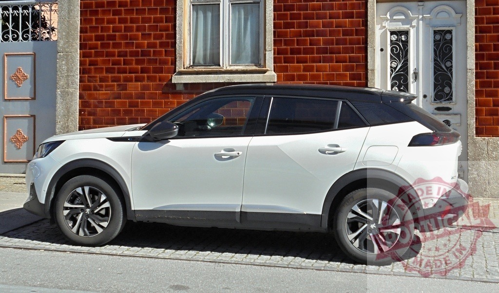 Peugeot 2008 SUV parked on urban street | White Peugeot 2008 crossover vehicle standing next to a traditional building with tiles - Realized with Pictrs.com