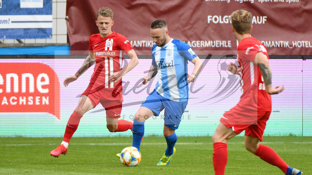 SVMFCH20200606_0013 | Fussball, Herren: Nico Neidhart (FC Hansa Rostock) und Marius Kleinsorge (SV Meppen) im Zweikampf bei dem Spiel der 3. Liga zwischen SV Meppen und FC Hansa Rostock in der Haensch-Arena am 06.06.2020 in Meppen, Deutschland.DFB / DFL REGULATIONS PROHIBIT ANY USE OF PHOTOGRAPHS AS IMAGE SEQUENCES AND/OR QUASI-VIDEO. - Realisiert mit Pictrs.com