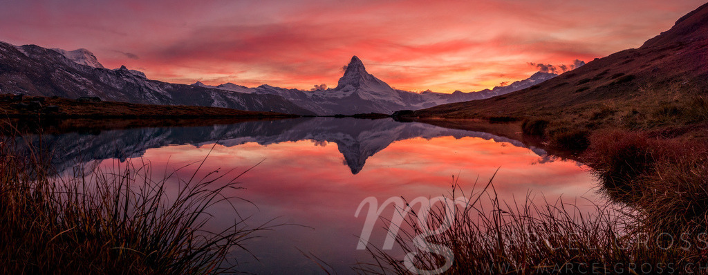 matterhorn in red | spectacular sunset over Matterhorn with reflection in mountain lake - Realisiert mit Pictrs.com