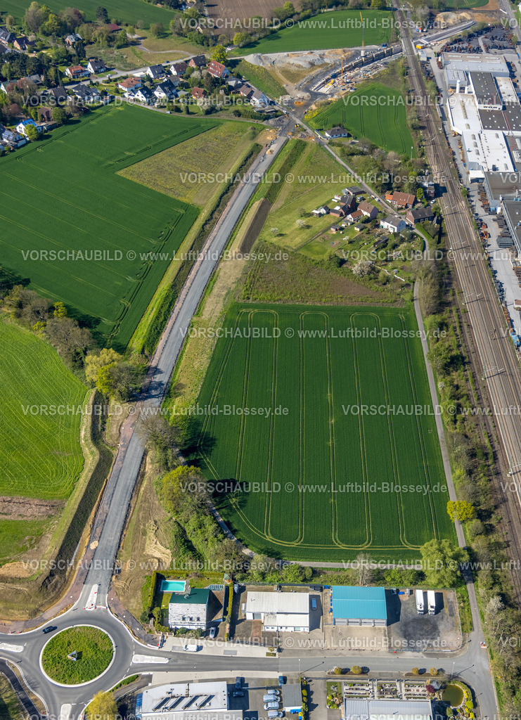 Kamen230406035 | Luftbild, Baustelle und neuer Kreisverkehr, Wiesenfläche, Gewerbegebiet zwischen Buschweg und Dortmunder Allee, Kamen, Ruhrgebiet, Nordrhein-Westfalen, Deutschland