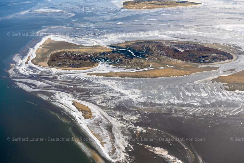 4044440 | NIGEHöRN 14.02.2021 Winterlich schneebedeckte Küstenbereich der Nordsee - Insel in Scharhörn Nigehörn im Bundesland Hamburg. // Wintry snowy coastal area of the North Sea - Island in Scharhoern in the state Hamburg. Foto: Gerhard Launer