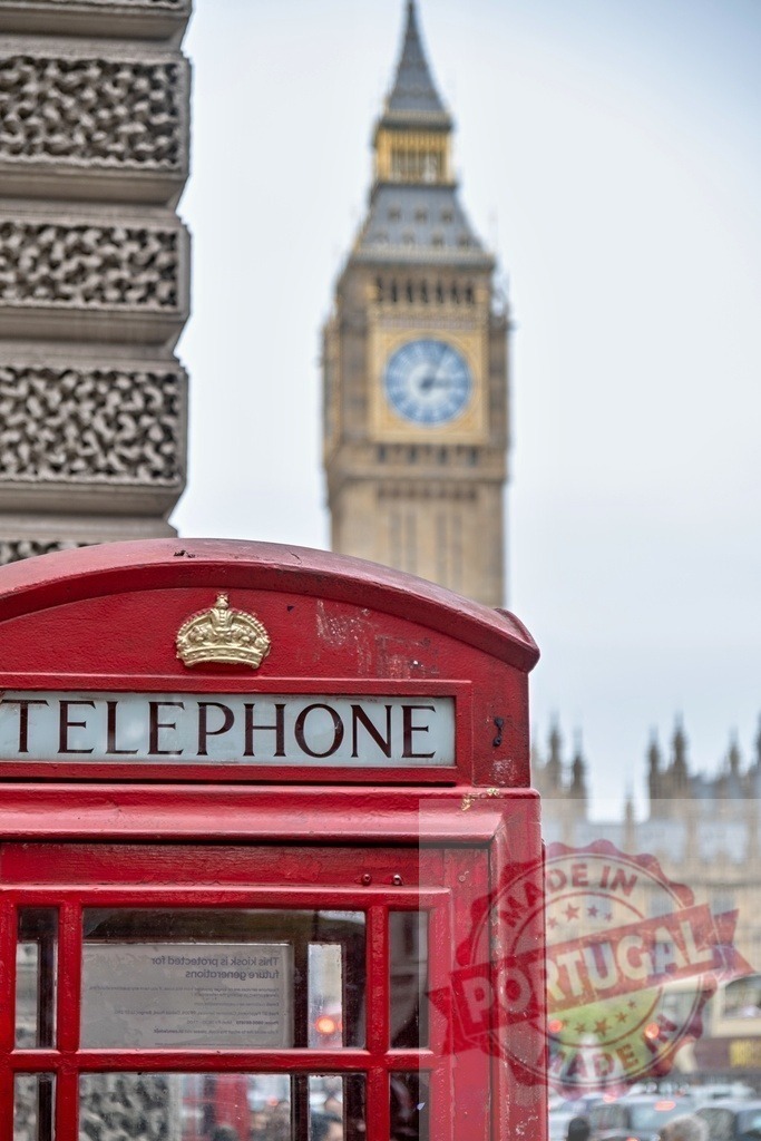 Iconic red telephone box and Big Ben in London | Red telephone box standing in front of Elizabeth Tower and London cityscape - Realized with Pictrs.com