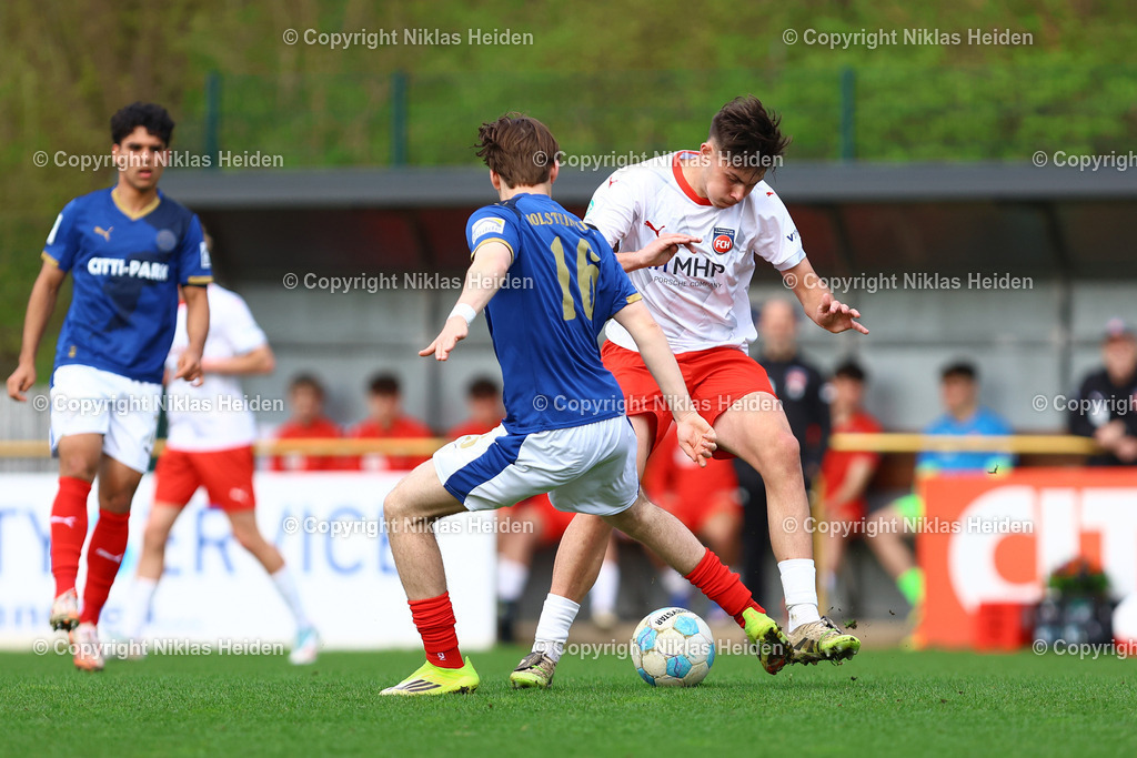 NH_HolsteinKielU19_1FCHeidenheimU19_DFBNachwuchsliga_18042026 | #16 Jonas Ahrens (Holstein Kiel U19), #14 Tim Radöhl (1. FC Heidenheim U19)Fußball I Herren I U19 DFB-Nachwuchsliga Hauptrunde Liga A, Gruppe B I Saison 2025-2026 I 9. Spieltag I Holstein Kiel U19 - 1. FC Heidenheim U19 I 18.04..2026 I Citti-Fußball-Park