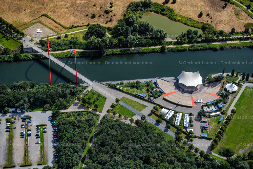 4050034 | Bogenbrücke Nordsternpark, Gelsenkirchen und Amphitheater-Gelsenkirchen - AmphitheaterGrothusstraße 20145883 GelsenkirchenDie Open-Air-Bühne mit Biergarten präsentiert direkt am Kanal Theater, große Rockkonzerte und Musikfestivals.