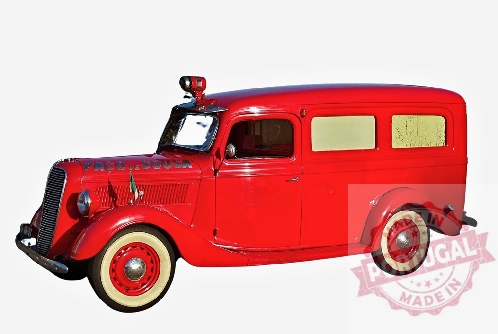 Restored vintage red fire truck from Fagundes Sousa from 1930s posing isolated | Restored vintage red fire truck from Fagundes Sousa posing isolated on white background - Realized with Pictrs.com