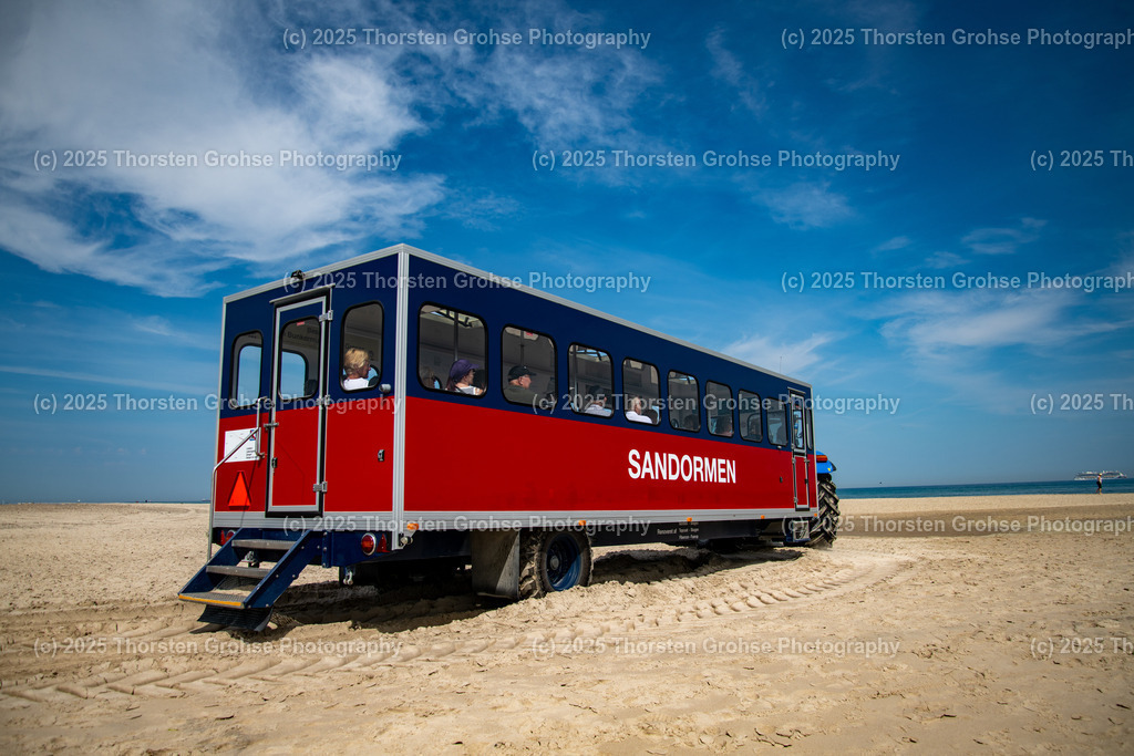 Tourist van Sandormen (The Sandworm) Grenen / Skagens Gren Denmark June 2023 / Touristentransporter Sandormen (Der Sandwurm) | Grenen or Skagens Gren is the sandy headland northeast of the town of Skagen in Denmark. It is the confluence of the North Sea/Skagerrak and the Kattegat/Baltic Sea. Tourist van Sandormen (The Sandworm) / Grenen oder Skagens Gren ist die sandige Landspitze nordöstlich der Stadt Skagen in Dänemark. Es ist der Zusammenfluss von Nordsee / Skagerrak und Kattegat / Ostsee - Realisiert mit Pictrs.com