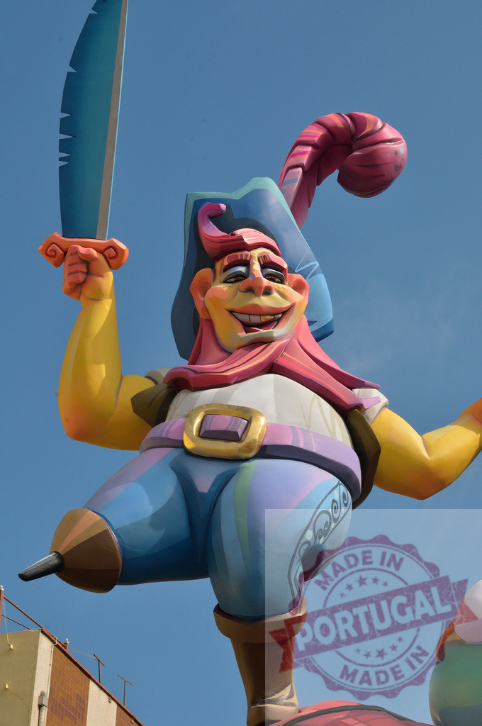 Colorful pirate sculpture character celebrating Las Fallas festival. Fallas Fiestas Communidad Valenciana | Joyful pirate character sculpture with a sword and peg leg from the Las Fallas festival - Realized with Pictrs.com
