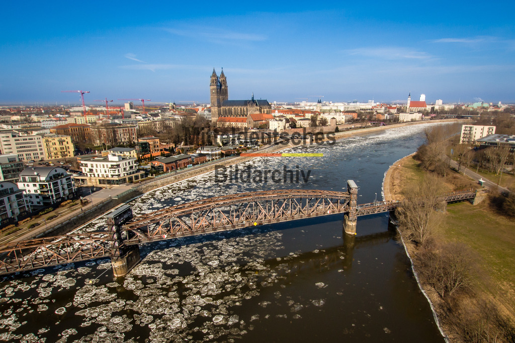 Sternbrücke Dom Eisschollen-8730 | Magdeburg Hubbrücke und Elbe im Winter mit Eisschollen - Realisiert mit Pictrs.com