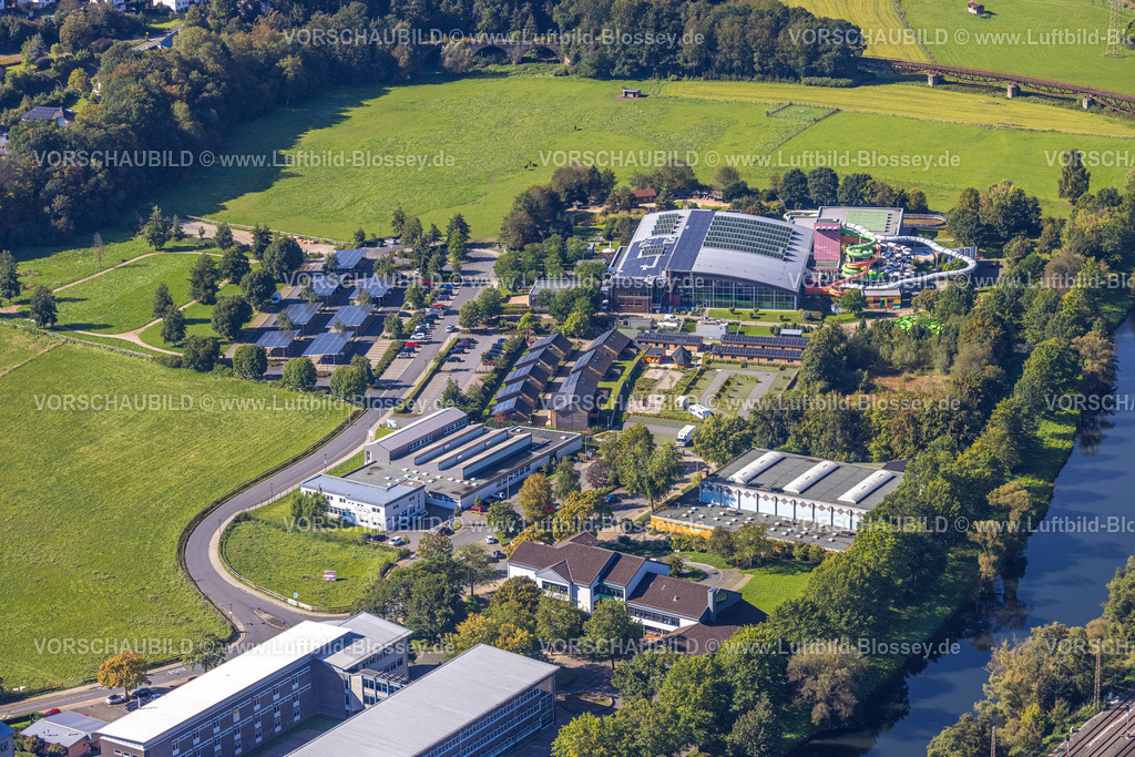 Plettenberg230908317 | Luftbild, Erlebnisbad AquaMagis mit großer Wasserrutsche, Ferienhäuser AquaMagis, Mark-E Charging Station Ladestation für Elektrofahrzeuge mit Solardach, Privatschule Ausbildungsgesellschaft Mittel-Lenne mbH, Dreifachturnhalle II Böddinghausen, Holthausen, Plettenberg, Sauerland, Nordrhein-Westfalen, Deutschland