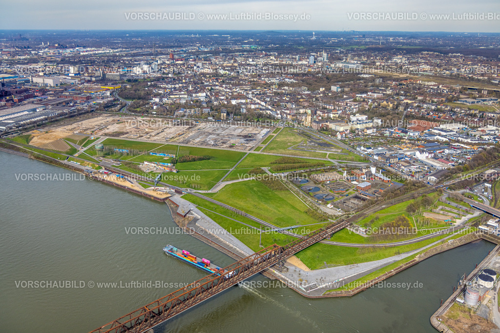 Duisburg230302091 | Luftbild, Rheinpark Duisburg am Fluss Rhein und geplante Wohnanlage RheinOrt Hochfeld, Hochfelder Eisenbahnbrücke über den Fluss Rhein, künftiges IGA-Gelände, Hochfeld, Duisburg, Ruhrgebiet, Nordrhein-Westfalen, Deutschland