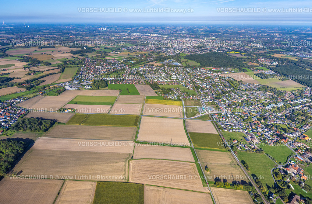 Hamm250900499 | Luftbild, geplanter Haltepunkt in Westtünnen, Baustelle am Südfeldweg und Von-Thünen-Straße für den künftigen Bahnhaltepunkt, Wiesen und Felder am Südfeldweg, Blick zur City, Stadtbezirk Rhynern, Hamm, Ruhrgebiet, Nordrhein-Westfalen, Deutschland