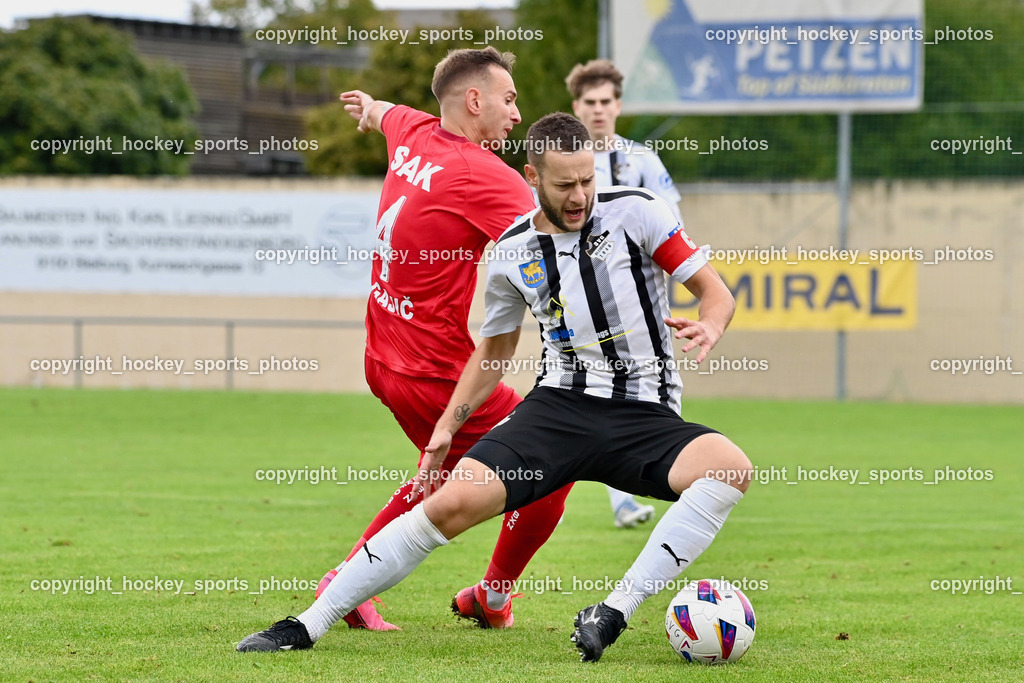 SVG Bleiburg vs. SAK 23.9.2023 | #4 Marko Gajic SAK, #9 Adnan Besic (K) SVG Bleiburg, SVG Bleiburg vs. SAK 23.9.2023, SVG Bleiburg vs. SAK am 23.09.2023 in Bleiburg (Karl Kornberger Stadion), Austria, (Photo by Bernd Stefan)