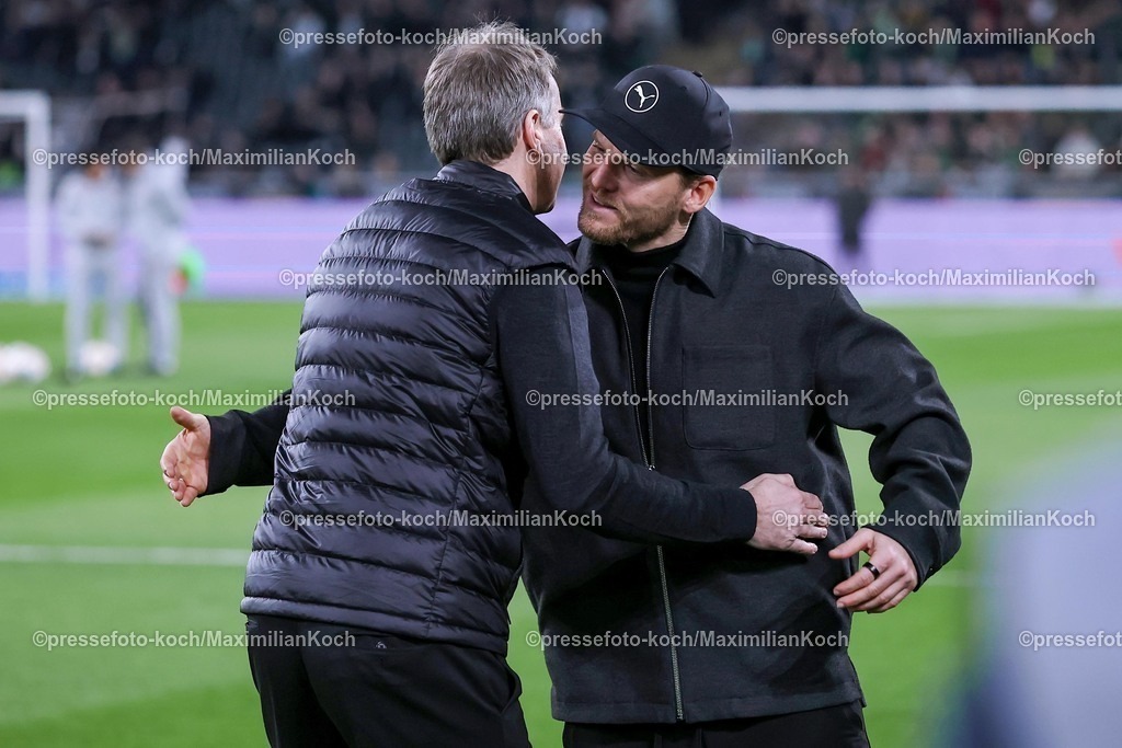 BMG07022601002 | 07.02.2026, Fußball, Borussia Mönchengladbach - Bayer 04 Leverkusen, 1. Fußball Bundesliga, 21.Spieltag, Borussia-Park, Saison 2025 2026: Head Coach Kasper Hjulmand (Bayer04 Leverkusen #hc) zusammen mit Cheftrainer Eugen Polanski (Borussia Mönchengladbach) Umarmung  DFB regulations prohibit any use of photographs as image sequences and or quasi-video.