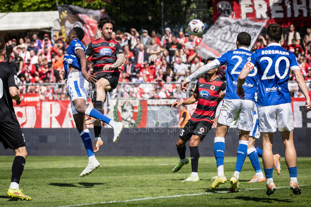German 3rd Division, Viktoria Koeln vs. Energie Cottbus, 26.04.2026 | KOELN, GERMANY - APRIL 26, 2026:  Simon Handle (FC Viktoria Koeln, 7) with a header during the 3rd division match on gameday 35 between Viktoria Koeln vs. Energie Cottbus at the Sportpark Hoehenberg on April 26, 2026 in Koeln, Germany. DFL REGULATIONS PROHIBIT ANY USE OF PHOTOGRAPHS AS IMAGE SEQUENCES AND/OR QUASI-VIDEO.