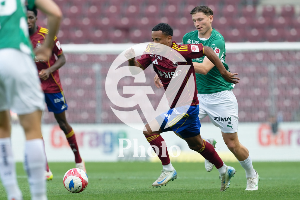 Brack Super League - Servette FC v FC Saint-Gall | Lilian Njoh (14 Servette FC) goes forward (action) during the Brack Super League match between Servette FC and FC Saint-Gall at Stade de Geneve in Geneva, Switzerland