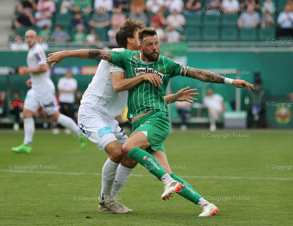 A_LUI_14042024_04 | SPORT,FUSSBALL.ADMIRAL BUNDESLIGA SK RAPID-AUSTRIA KLAGENFURT14.04.2024 IM BILD:GUIDO BURGSTALLER (RAPID) UNDTHORSTEN MAHRER (KLAGENFURT) FOTO.FOTOLUI/MW
